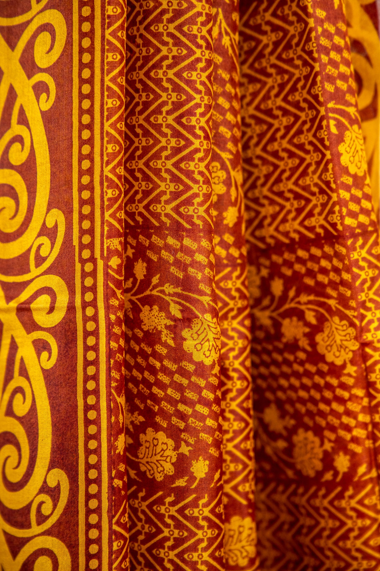 Mustard Yellow and Ochre Gold on a deep Rust-Brown base Pure Silk Saree