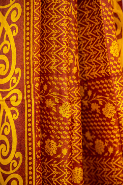 Mustard Yellow and Ochre Gold on a deep Rust-Brown base Pure Silk Saree