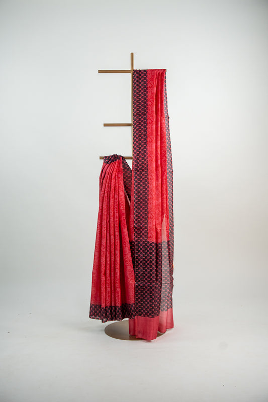 Crimson Red body with a solid Jet Black border Pure Silk Saree