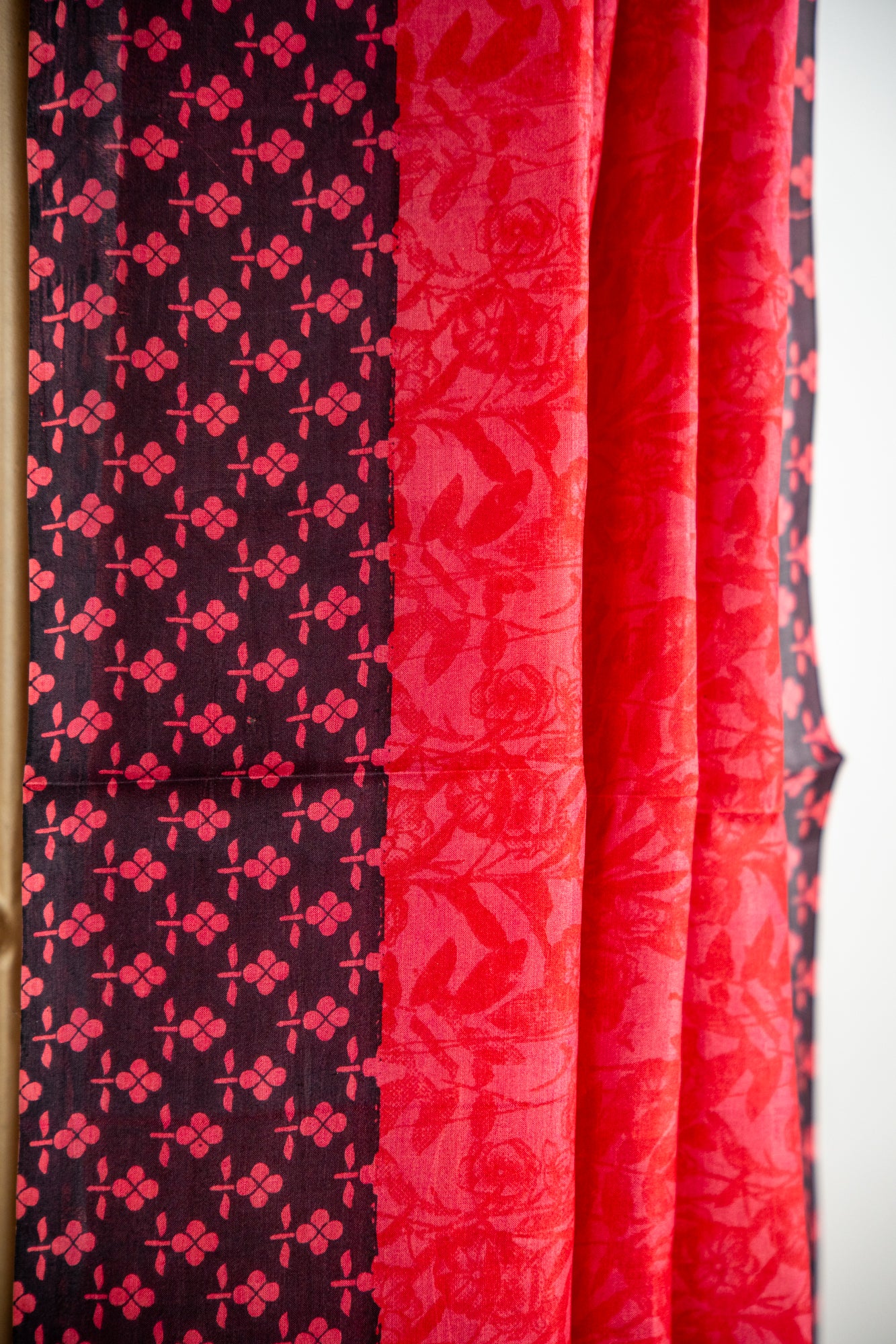 Crimson Red body with a solid Jet Black border Pure Silk Saree