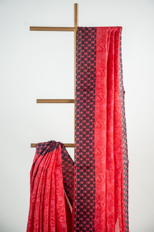 Crimson Red body with a solid Jet Black border Pure Silk Saree