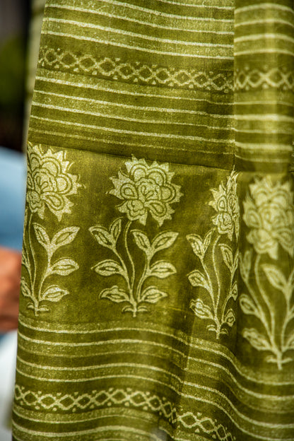 Olive Green / Muted Sage body with bright metallic/light gold highlights Pure Silk Saree