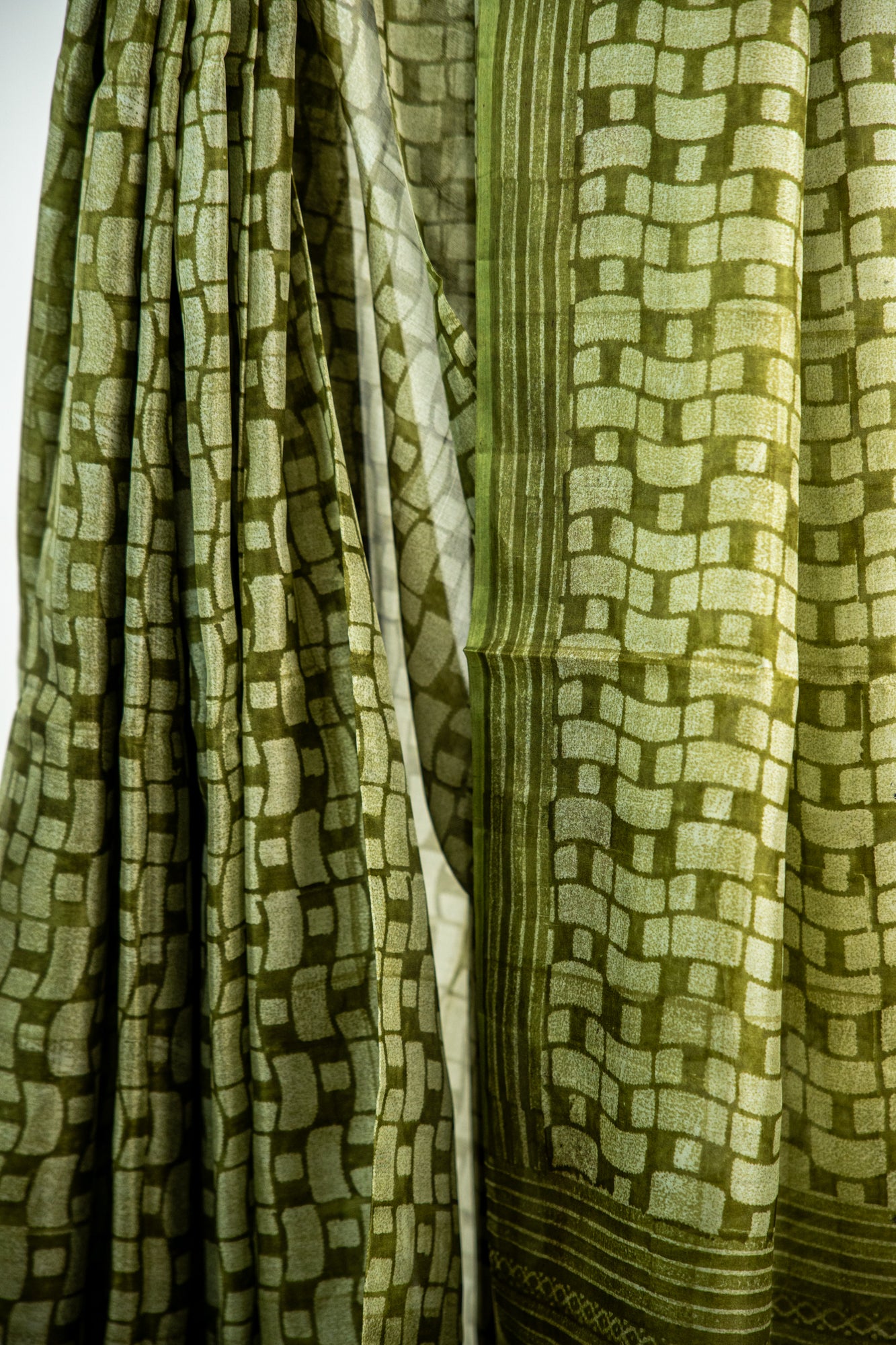 Olive Green / Muted Sage body with bright metallic/light gold highlights Pure Silk Saree