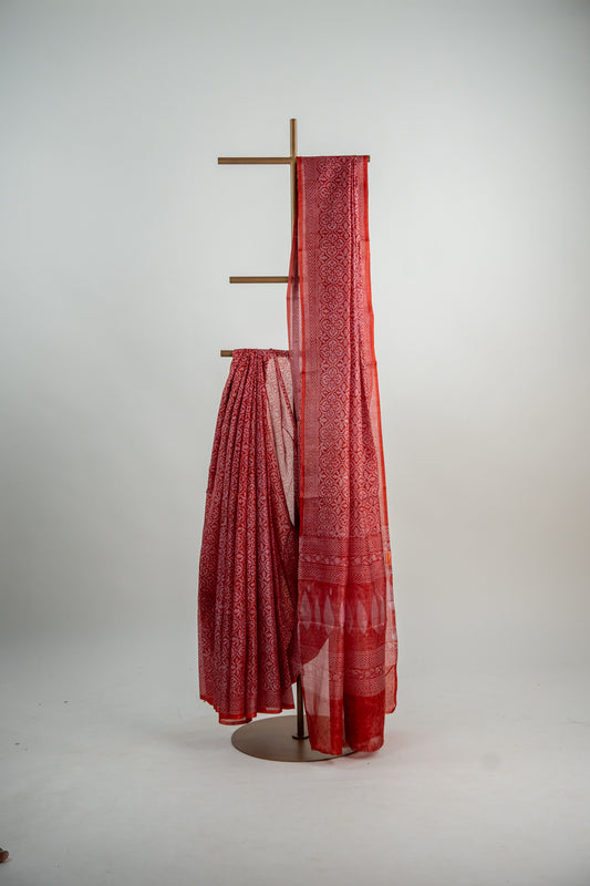 Terracotta Red / Rust-Orange tone with a softer rose-tinted accent Pure Silk Saree