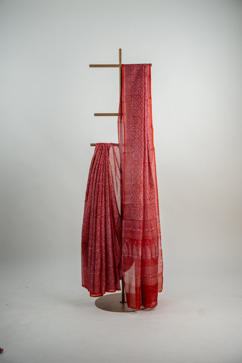 Terracotta Red / Rust-Orange tone with a softer rose-tinted accent Pure Silk Saree