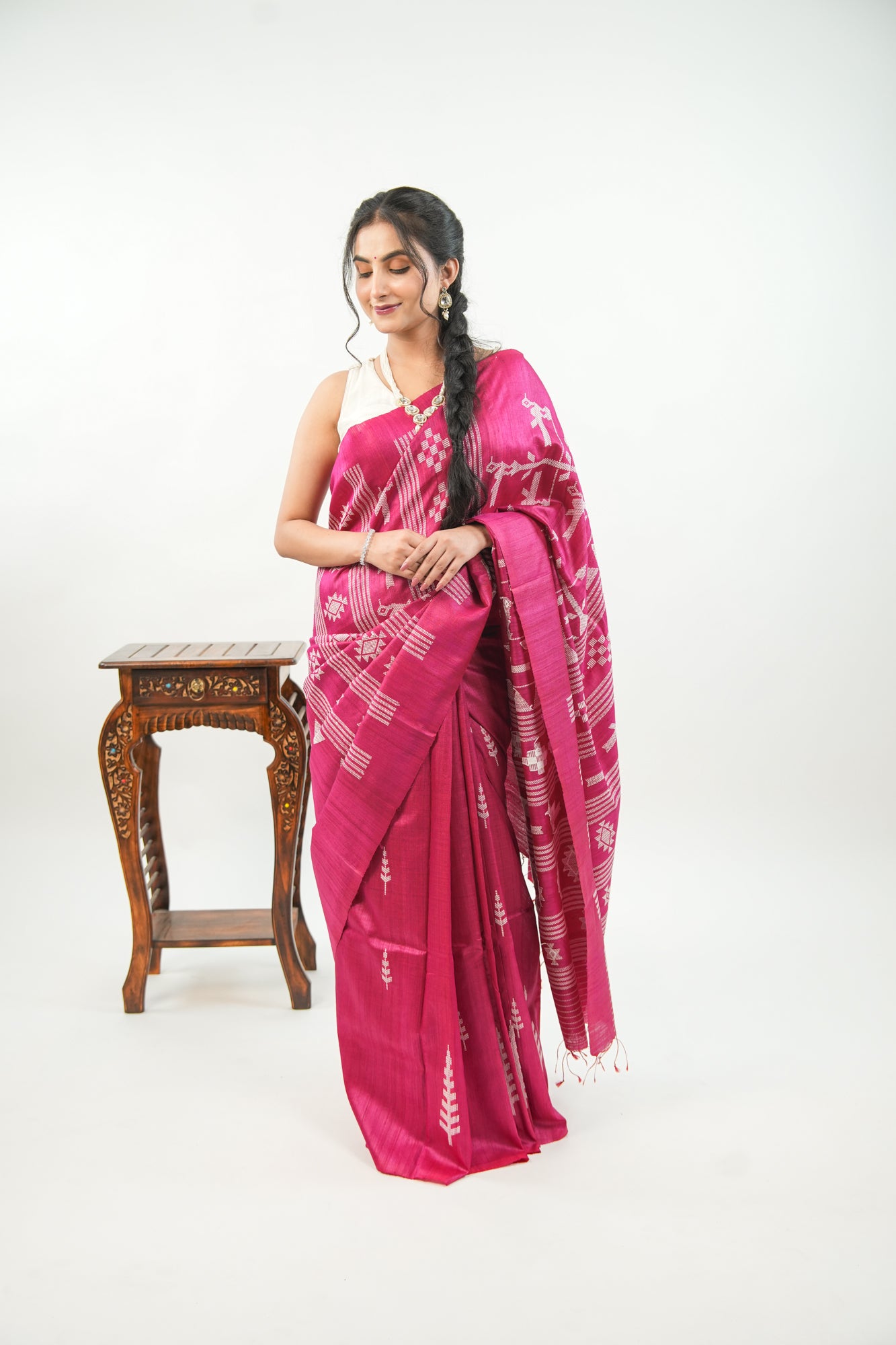Magenta Tussar Silk Saree with White Ikat Motifs