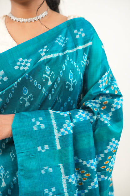 Sea Green Khandua Silk Saree with Wave & Tree Ikat Motifs