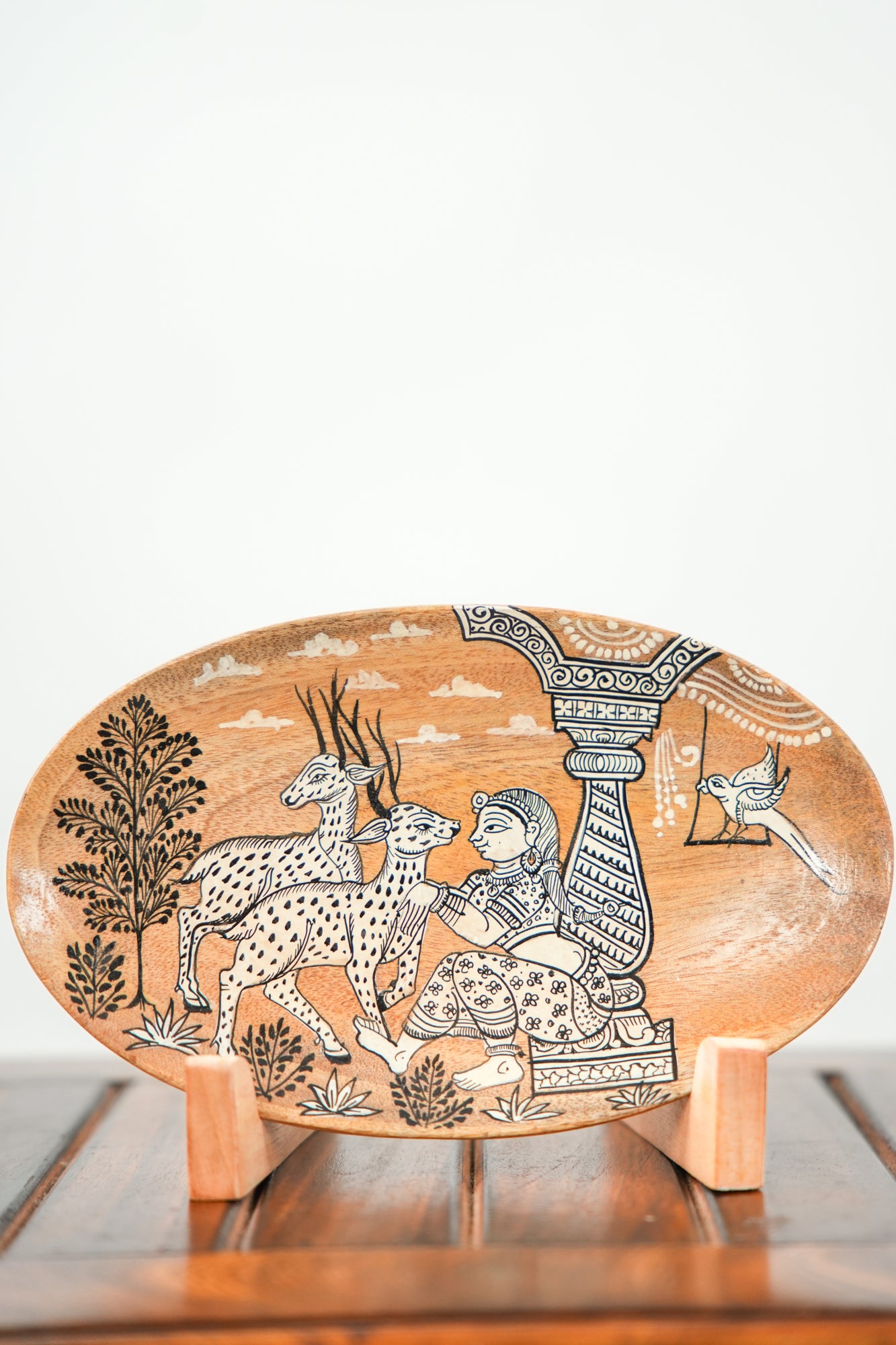 Seated Woman with Deer Under a Pillared Canopy | Pattachitra painting plate