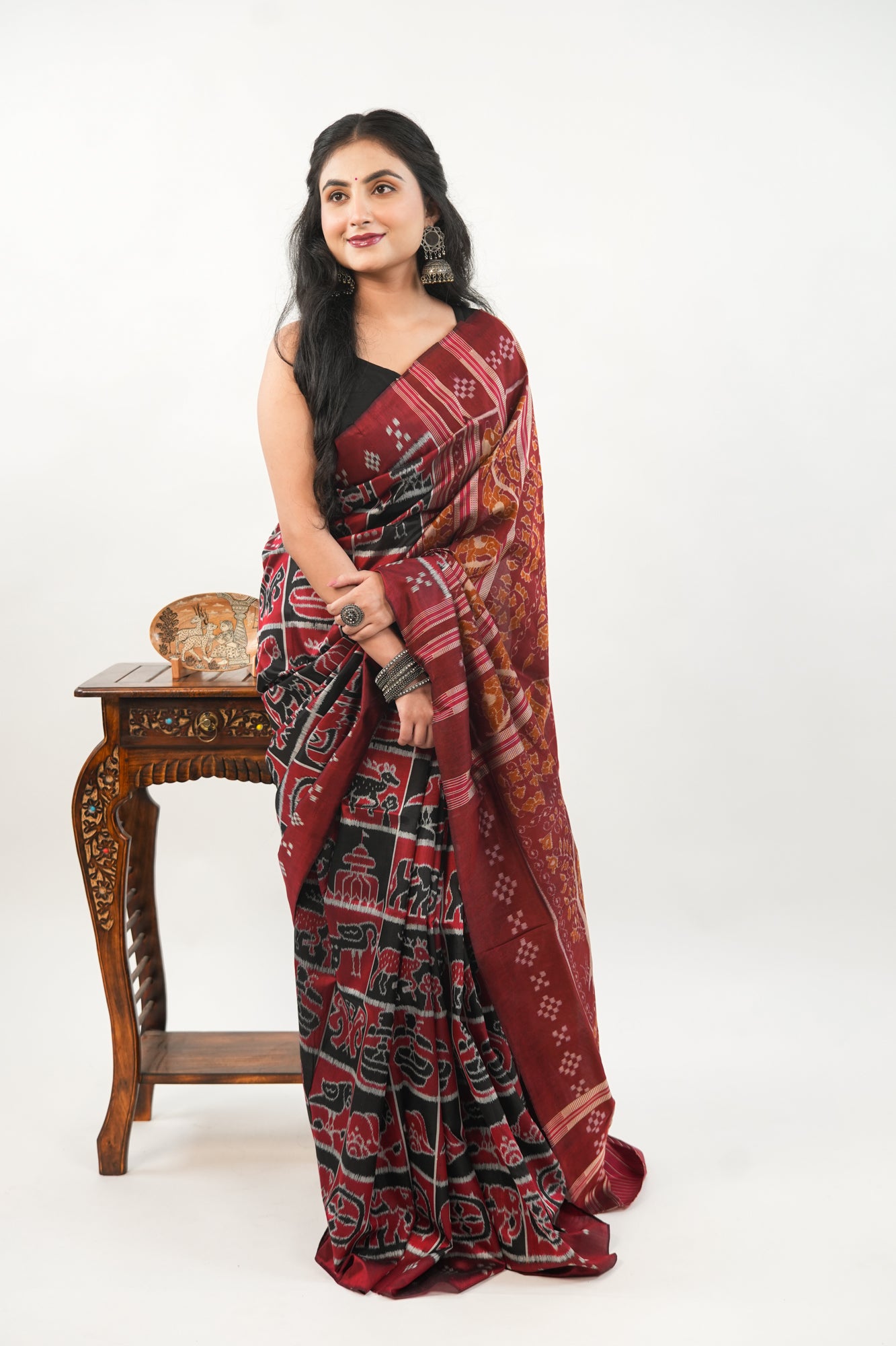 Brick Red & Black Khandua Silk Saree with Animal Ikat Motifs