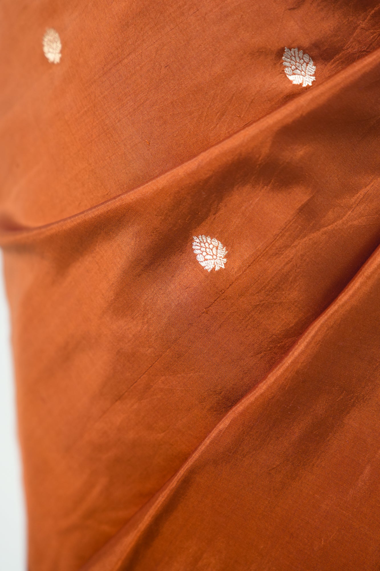 Rust Copper Banarasi Silk Saree with Paisley Kalka Border