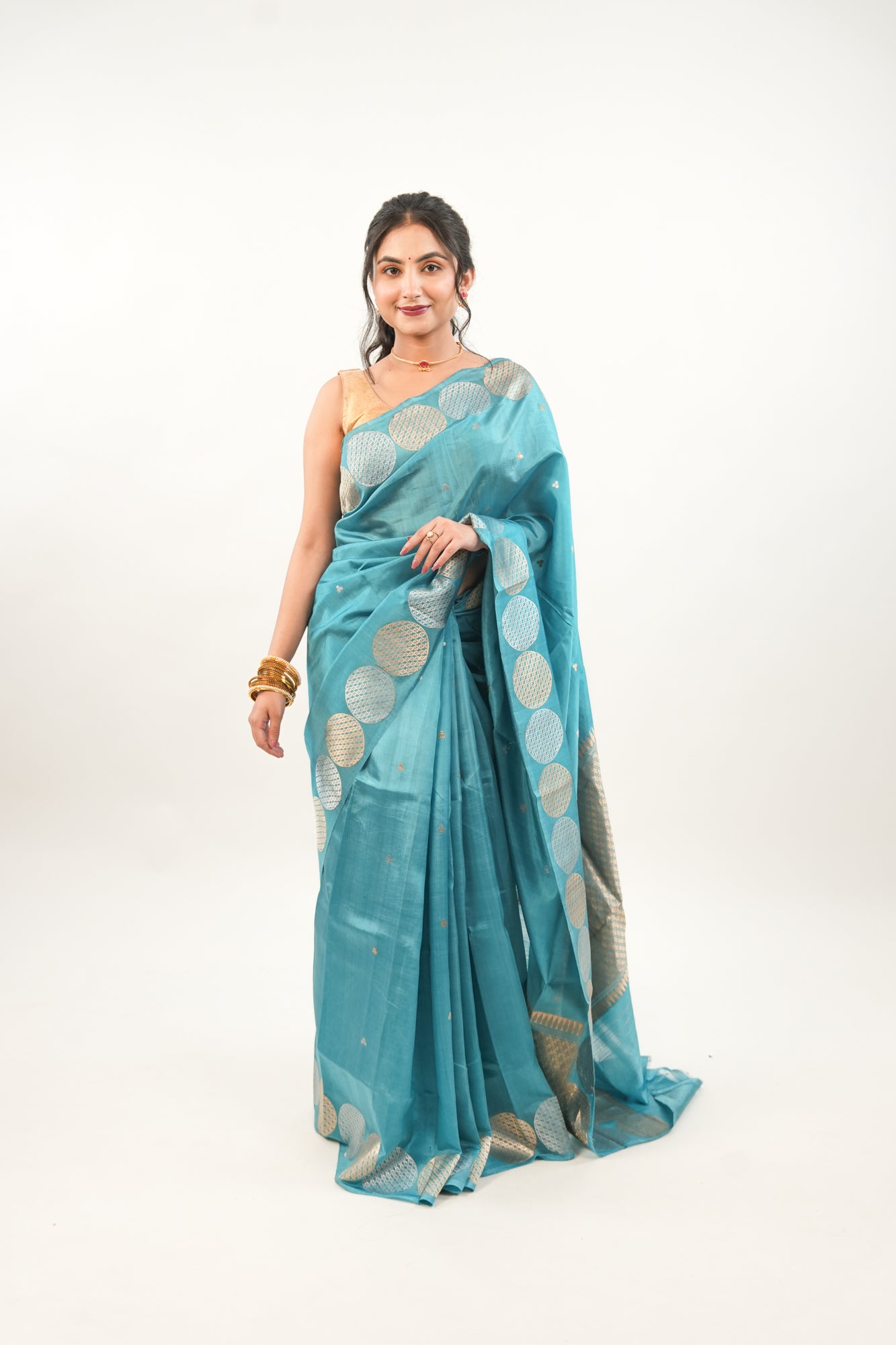 Peacock Teal Banarasi Silk Saree with Dual-Tone Chakra Border