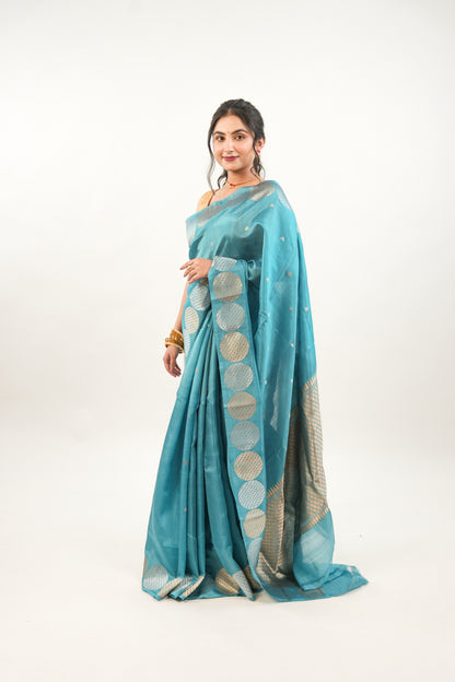 Peacock Teal Banarasi Silk Saree with Dual-Tone Chakra Border