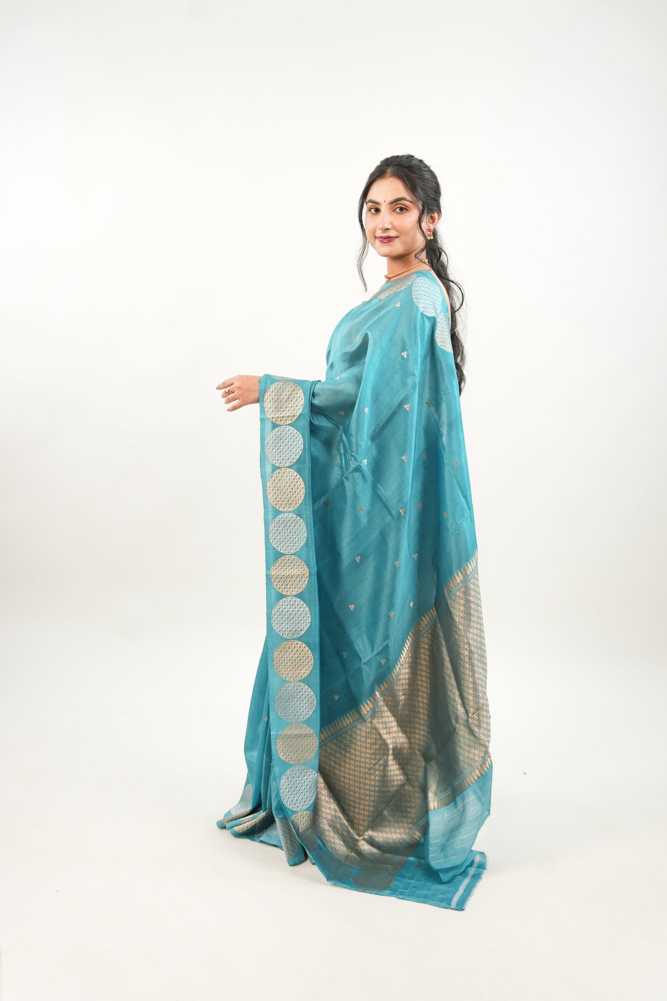 Peacock Teal Banarasi Silk Saree with Dual-Tone Chakra Border