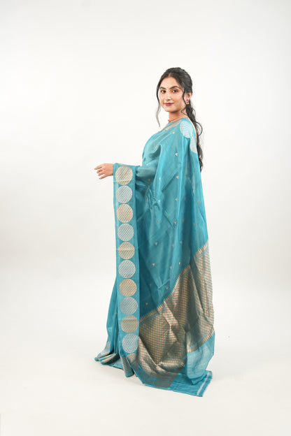 Peacock Teal Banarasi Silk Saree with Dual-Tone Chakra Border