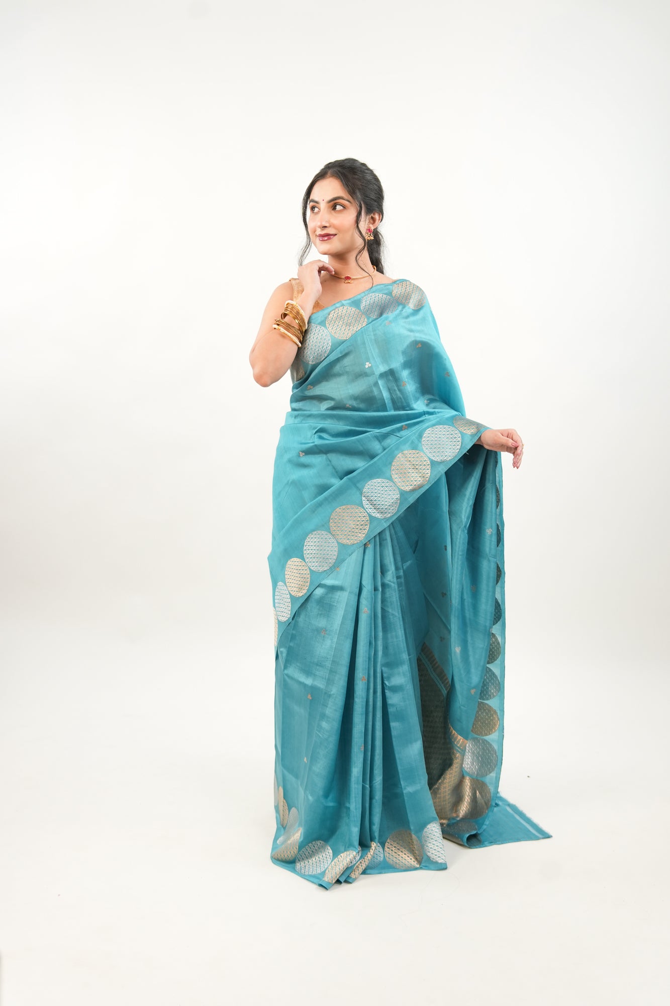 Peacock Teal Banarasi Silk Saree with Dual-Tone Chakra Border