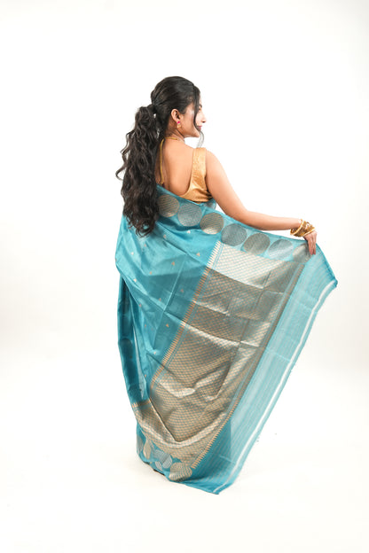 Peacock Teal Banarasi Silk Saree with Dual-Tone Chakra Border