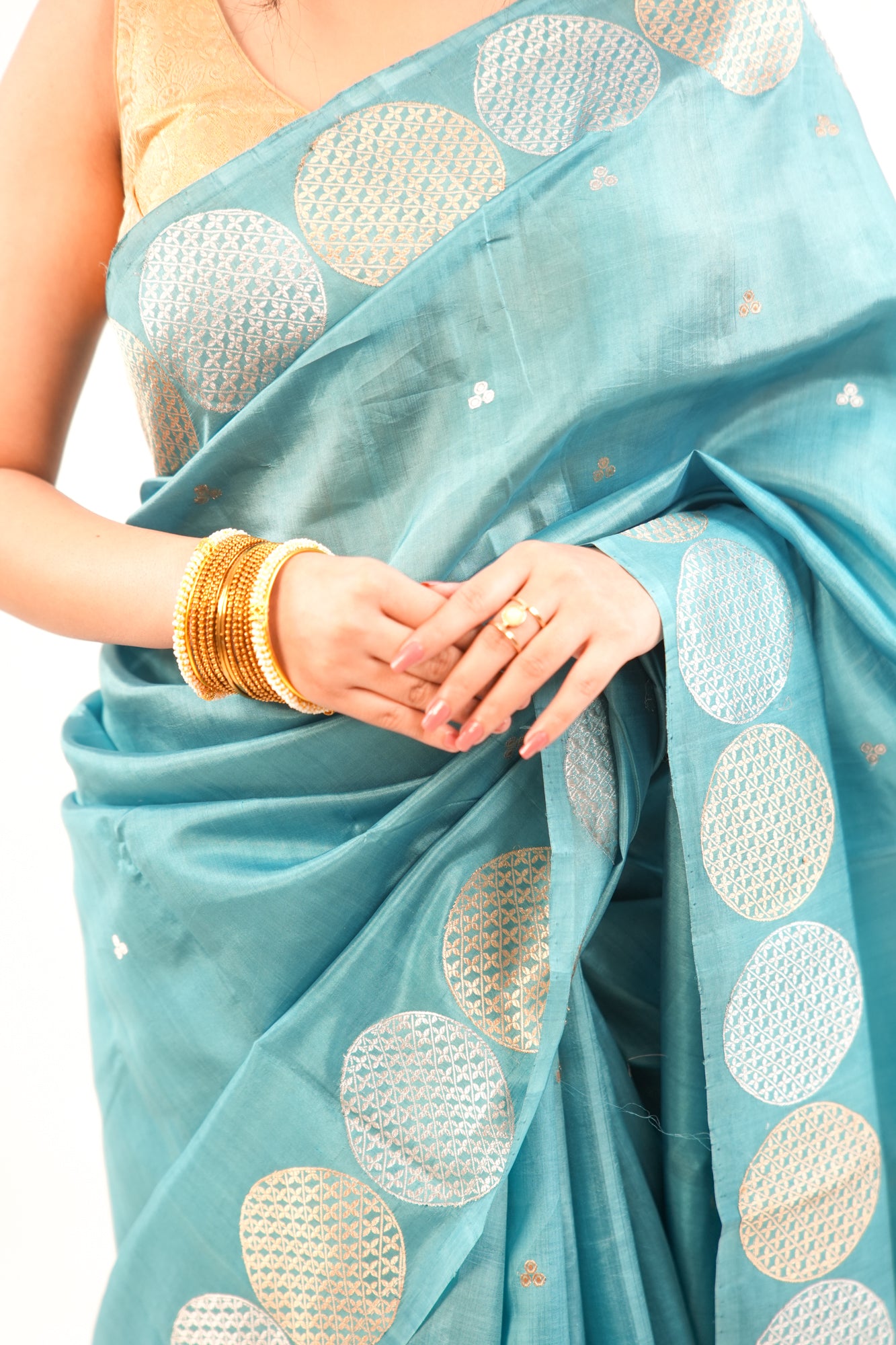 Peacock Teal Banarasi Silk Saree with Dual-Tone Chakra Border