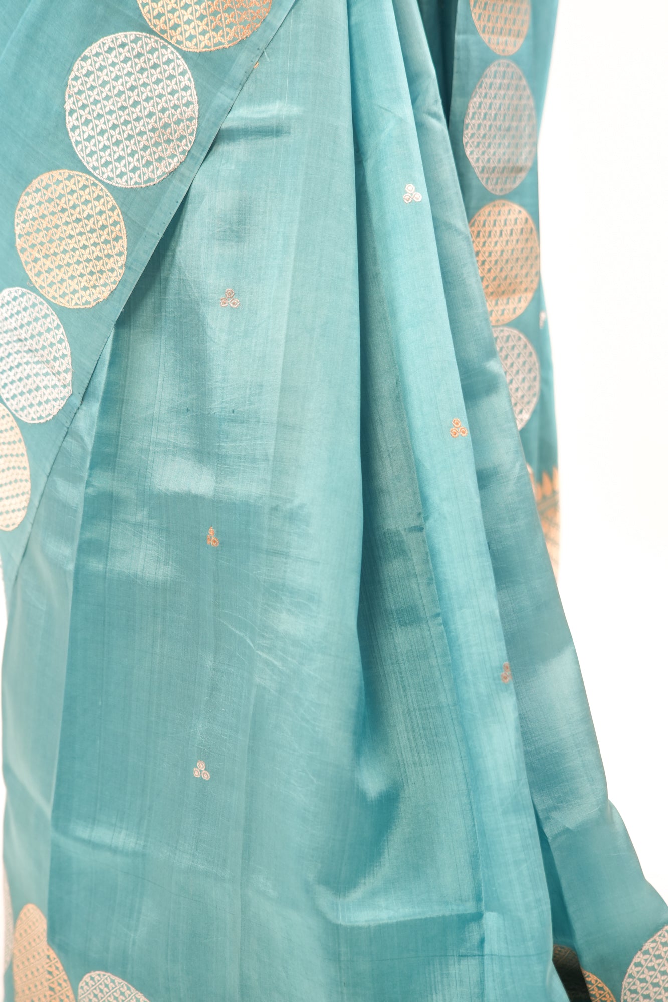 Peacock Teal Banarasi Silk Saree with Dual-Tone Chakra Border