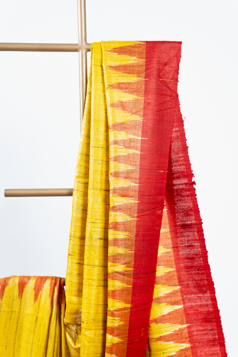 Mustard Yellow Tussar Silk Saree with Red Temple Border