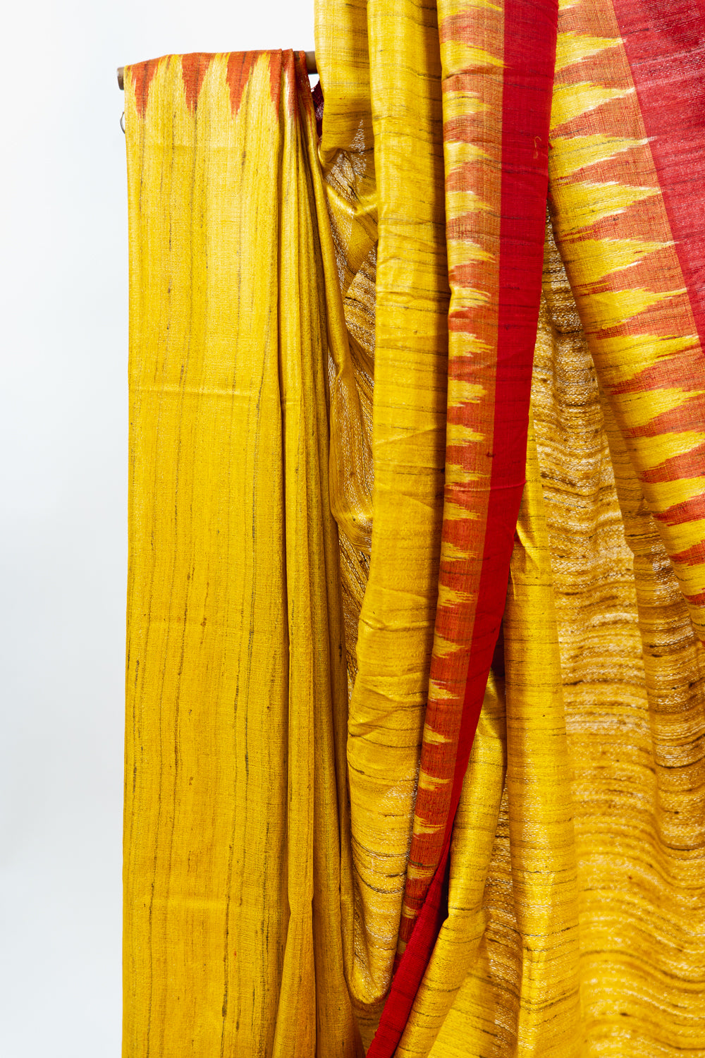 Mustard Yellow Tussar Silk Saree with Red Temple Border
