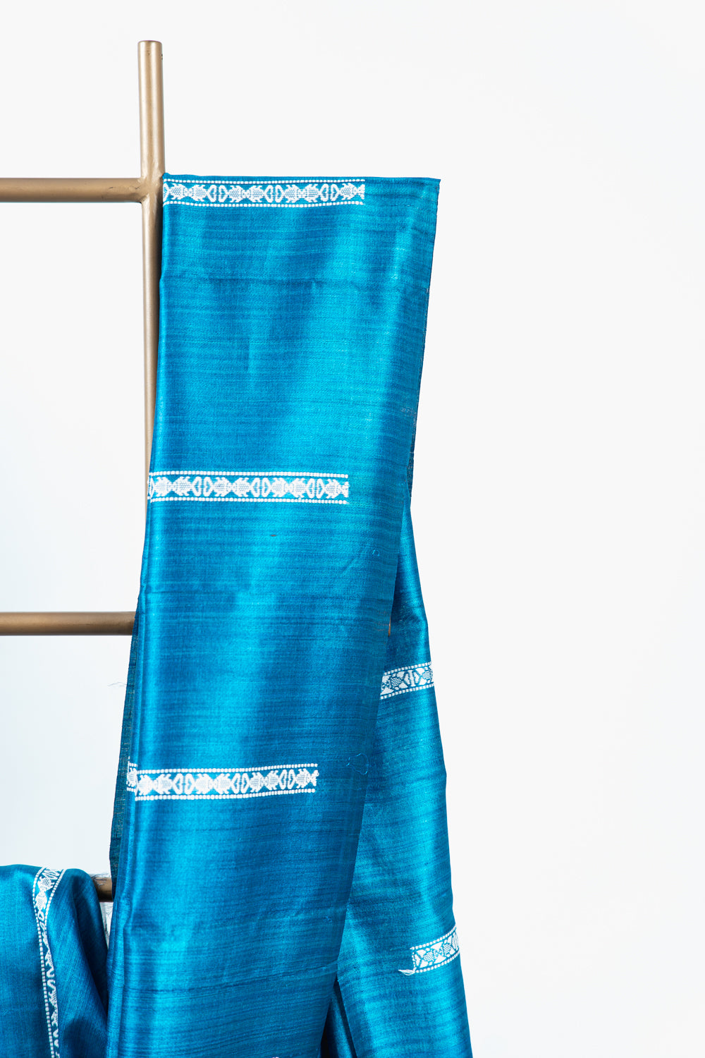 Teal Blue Tussar Silk Saree with White Geometric Border