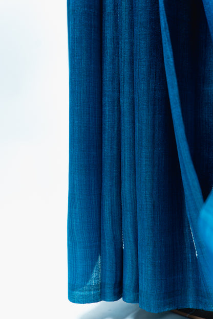 Teal Blue Tussar Silk Saree with White Geometric Border