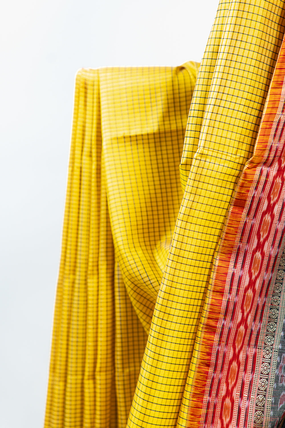 Turmeric Yellow Khandua Silk Saree with Hansa & Fish Ikat Border
