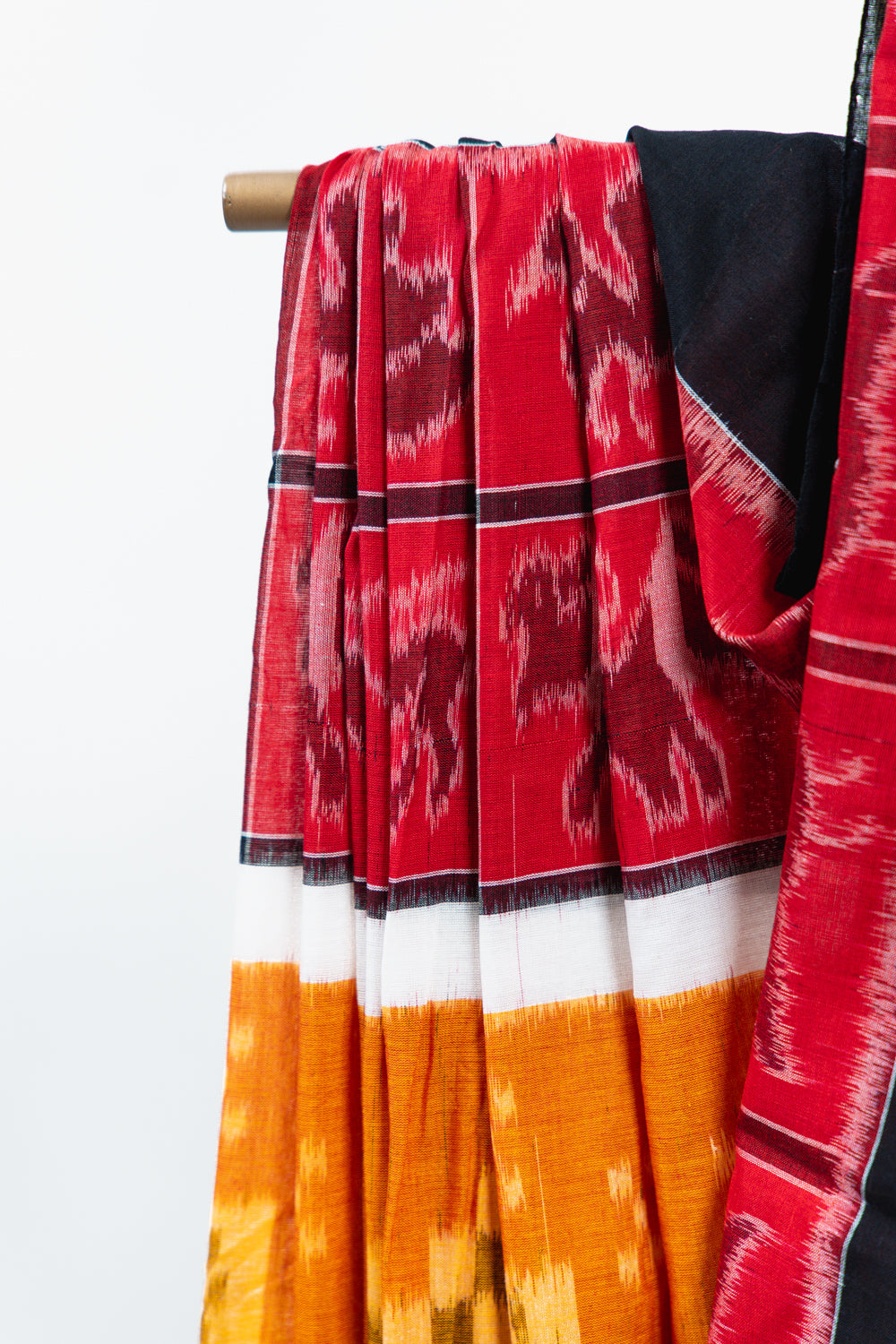 Rust Orange & Mustard Sambalpuri Cotton Saree with Geometric & Animal Ikat Motifs