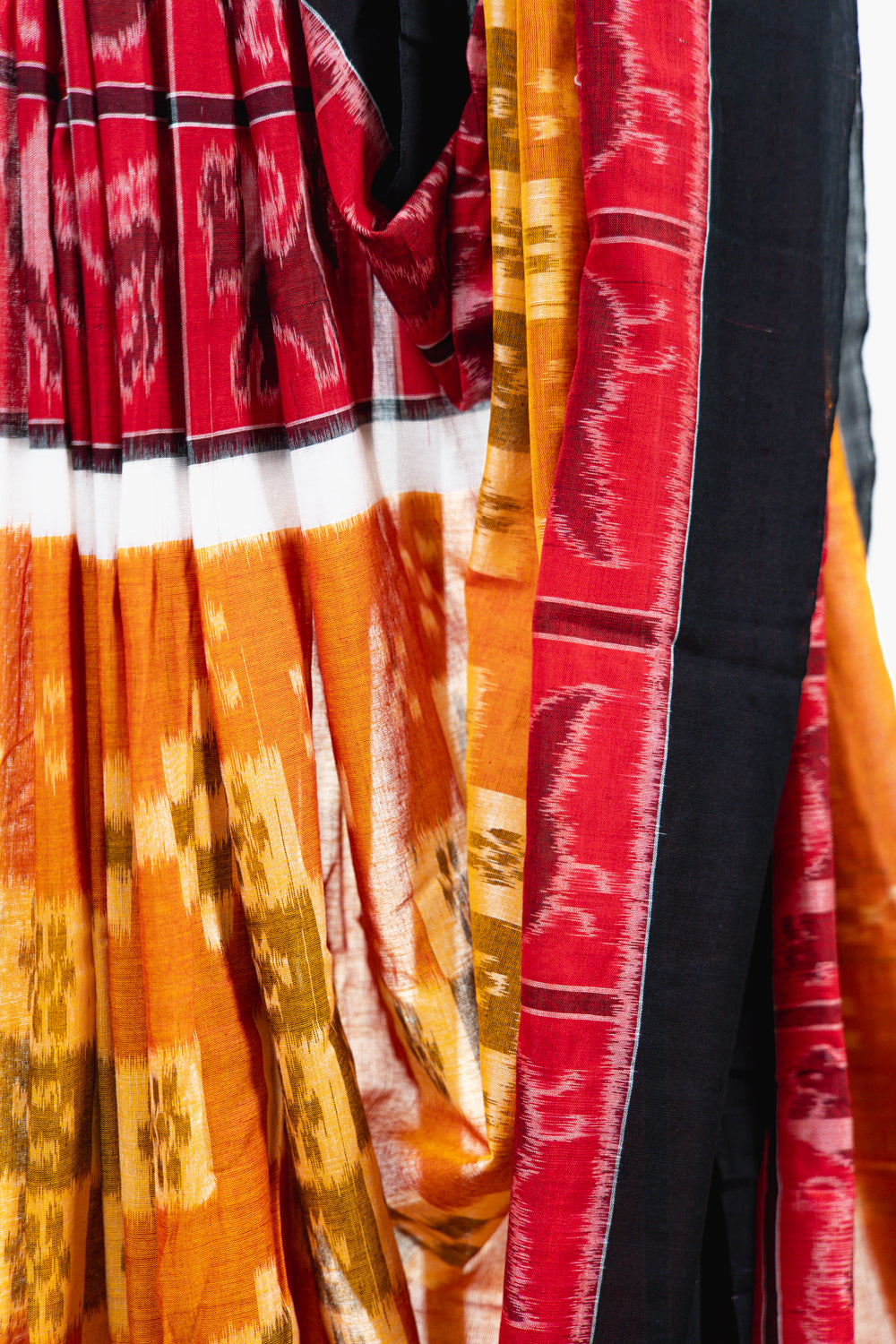 Rust Orange & Mustard Sambalpuri Cotton Saree with Geometric & Animal Ikat Motifs