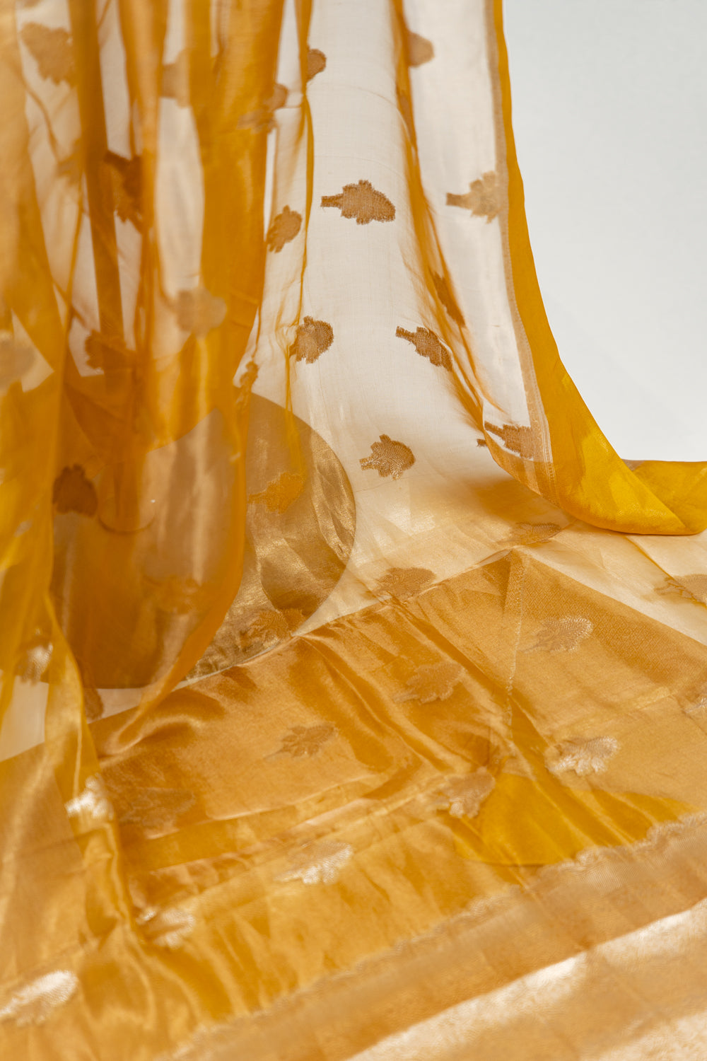 Mustard yellow Tissue Silk Saree