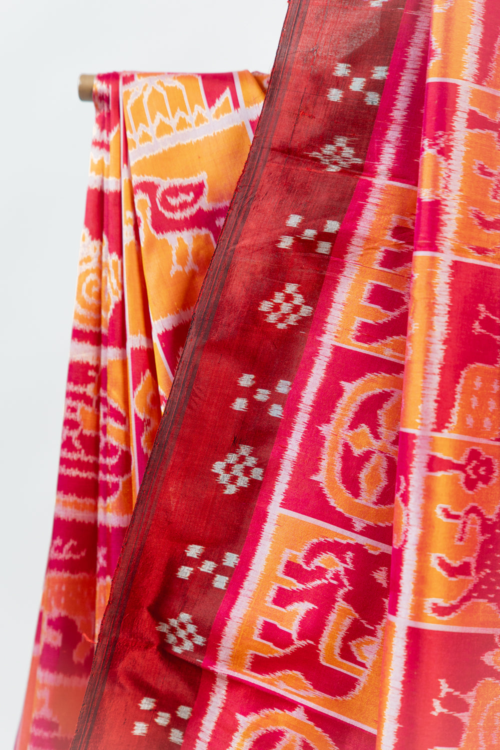 Maroon & Tangerine Orange Khandua Silk Saree with Jagannath Ikat Motifs