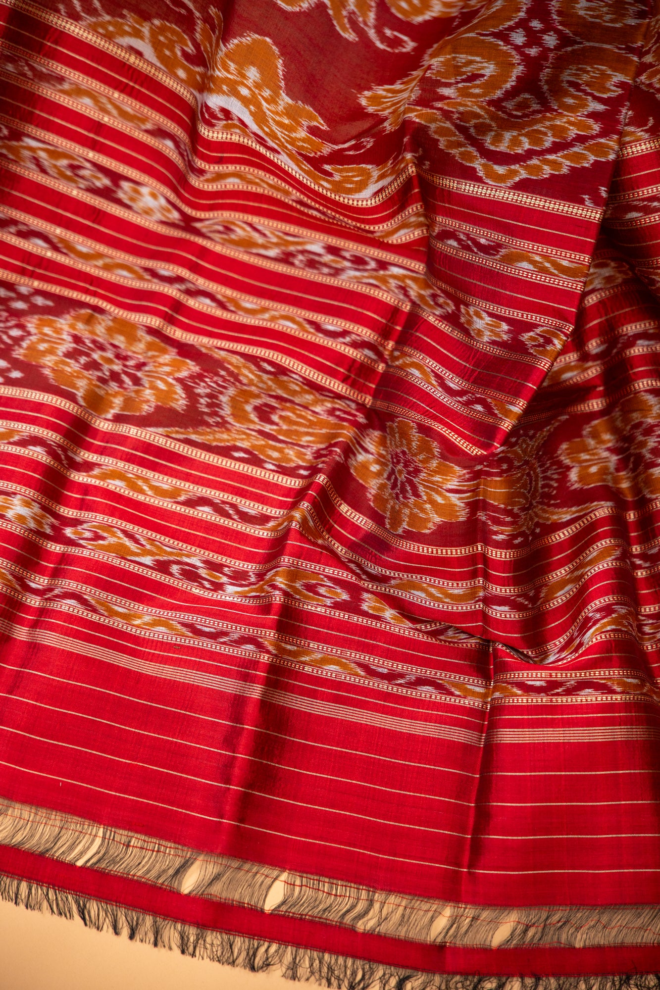 Handwoven Emerald Green Khandua Silk Saree with Deer & Tiger Ikat Border