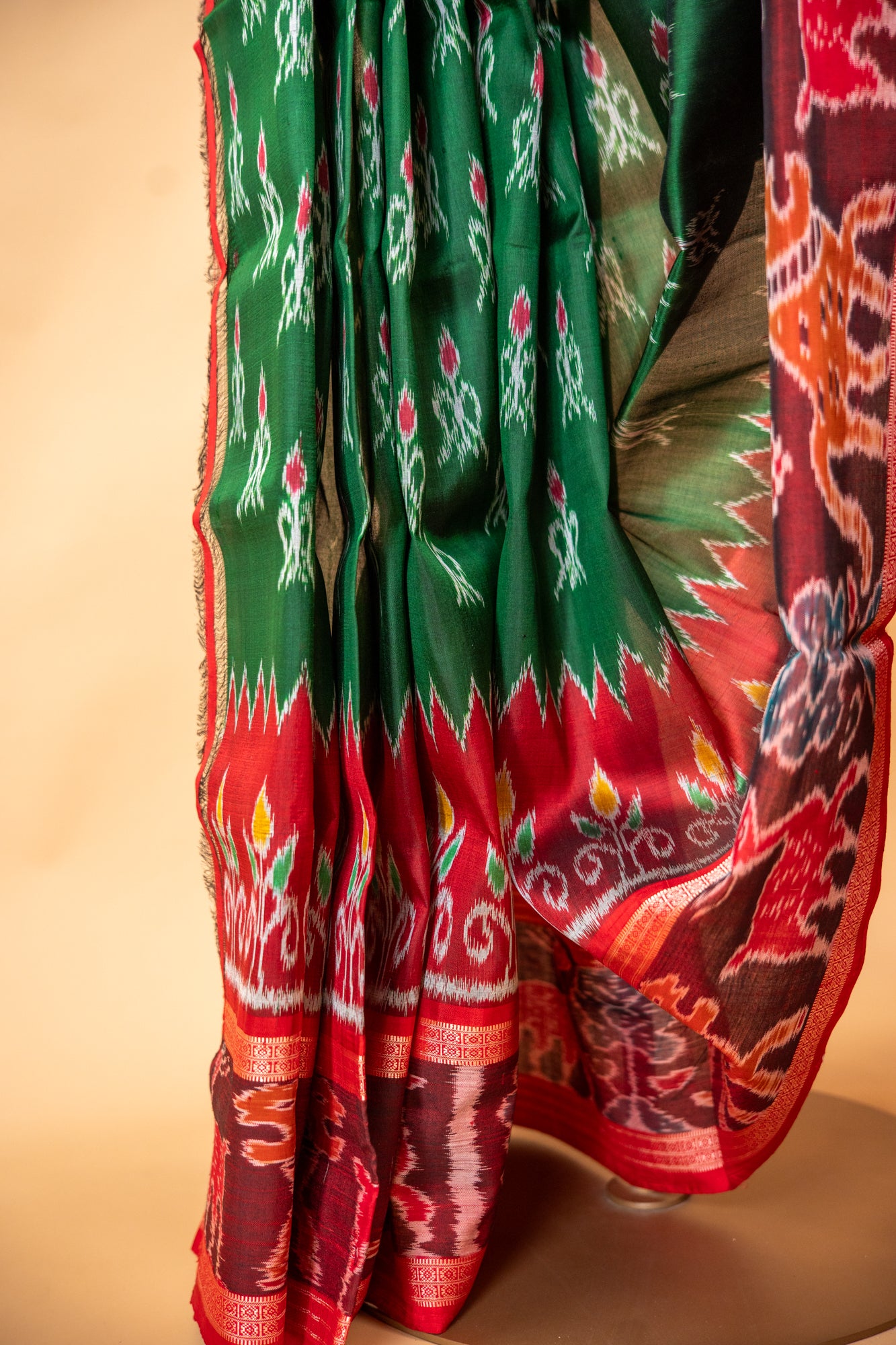 Handwoven Emerald Green Khandua Silk Saree with Deer & Tiger Ikat Border