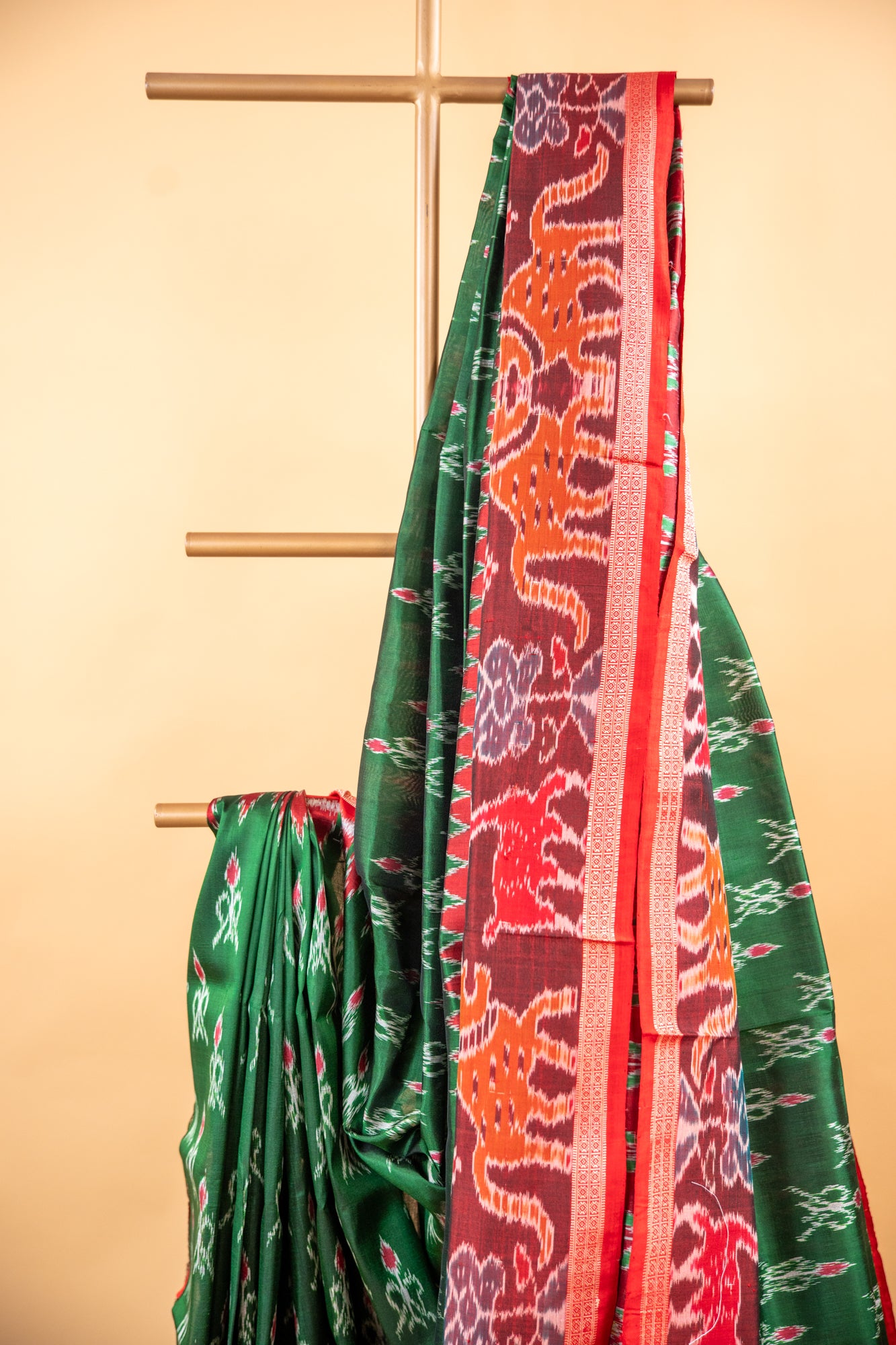 Handwoven Emerald Green Khandua Silk Saree with Deer & Tiger Ikat Border
