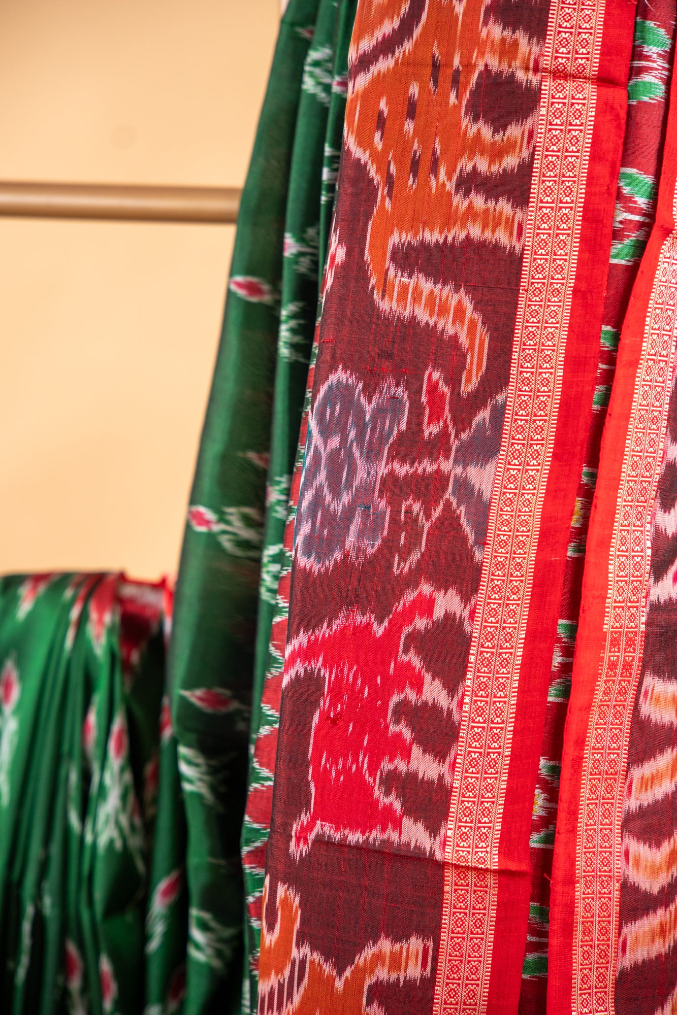 Handwoven Emerald Green Khandua Silk Saree with Deer & Tiger Ikat Border