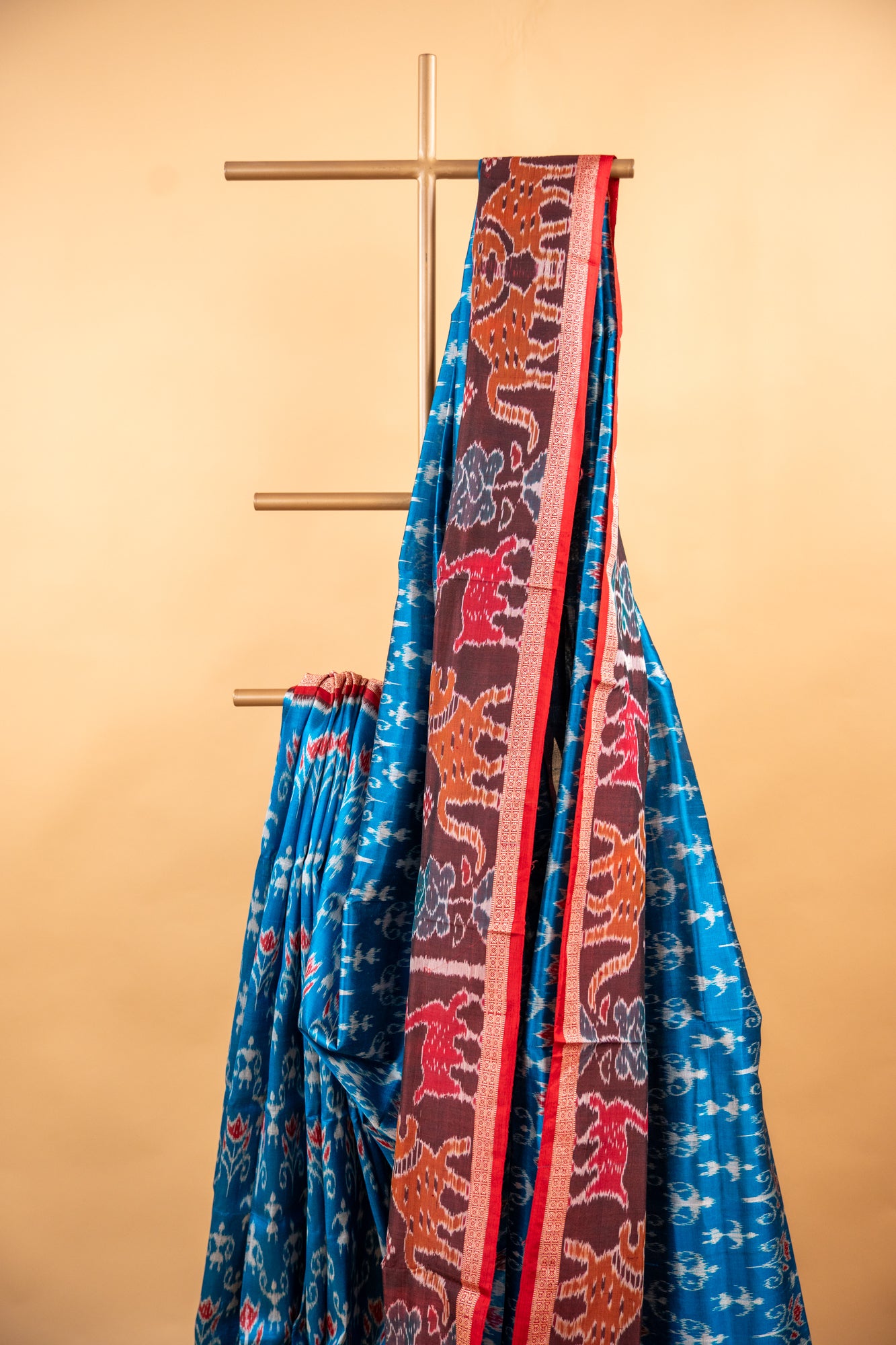 Handwoven Cerulean Blue Khandua Silk Saree with Traditional Narrative Border