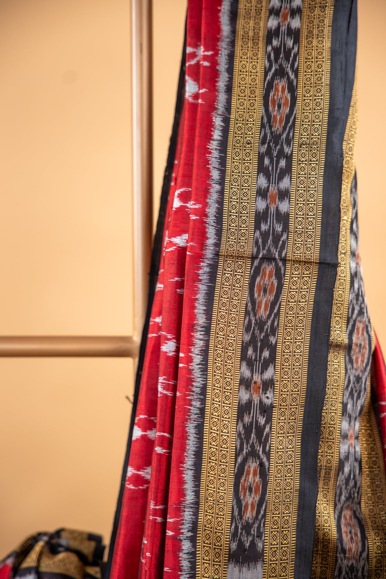 Handwoven Garnet Red Khandua Silk Saree with Tribal Saura Art Border