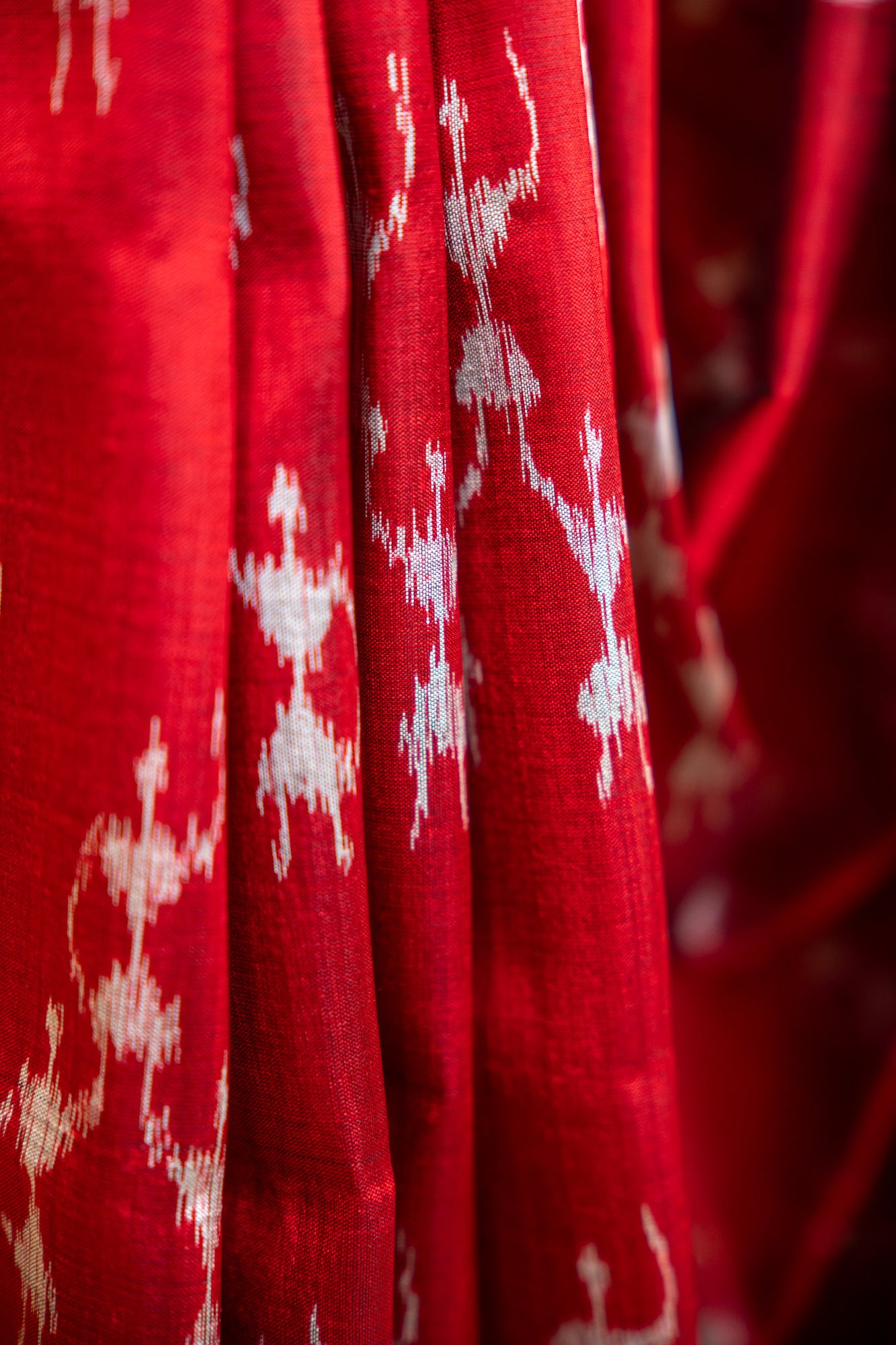 Handwoven Garnet Red Khandua Silk Saree with Tribal Saura Art Border