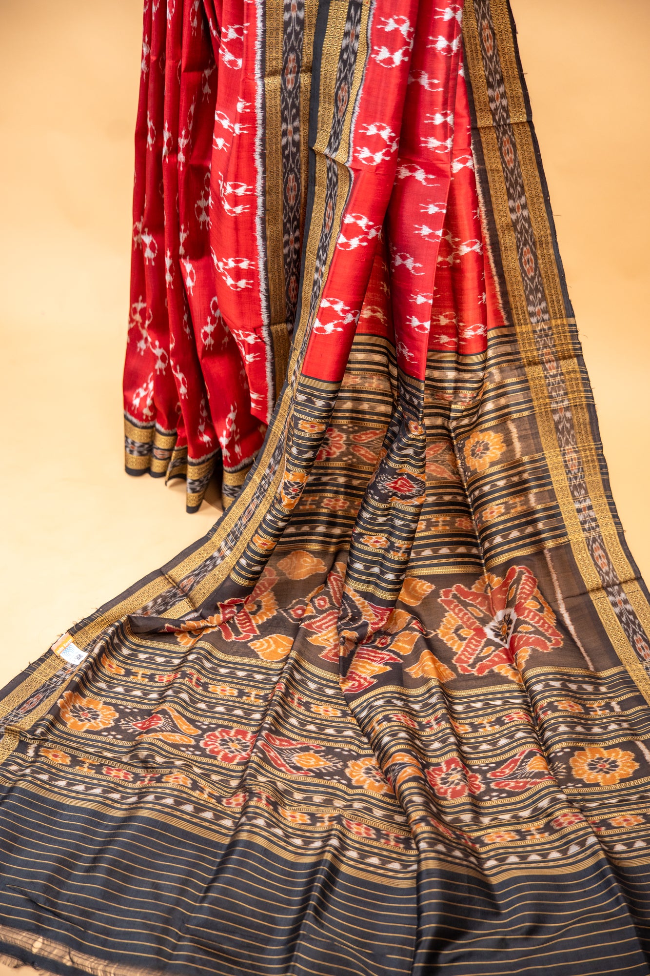 Handwoven Garnet Red Khandua Silk Saree with Tribal Saura Art Border