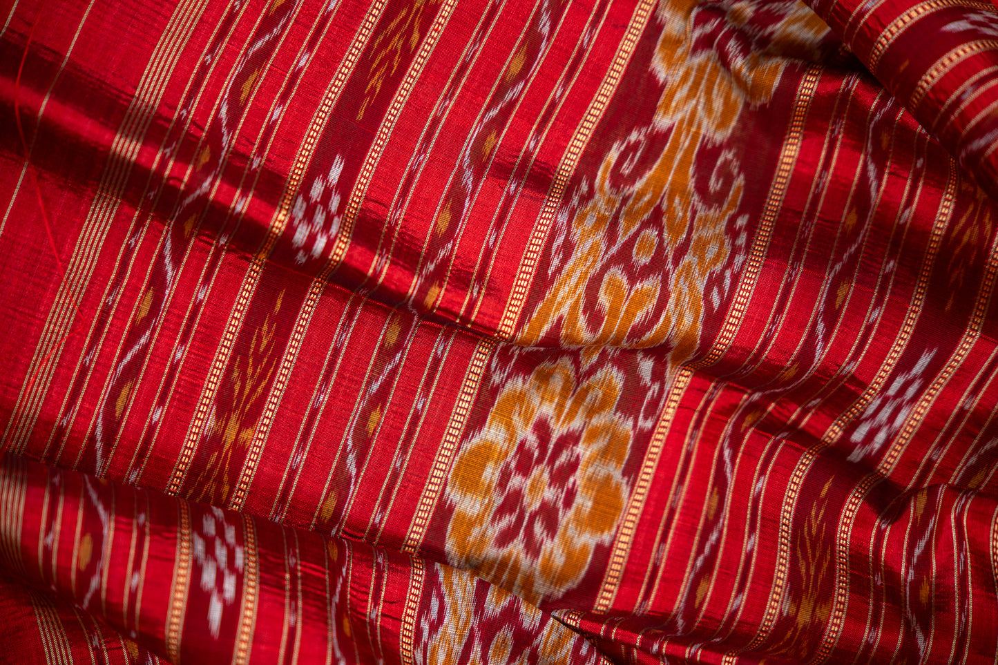 Ruby Red & Leaf Green Khandua Silk Saree with Animal Motif Border