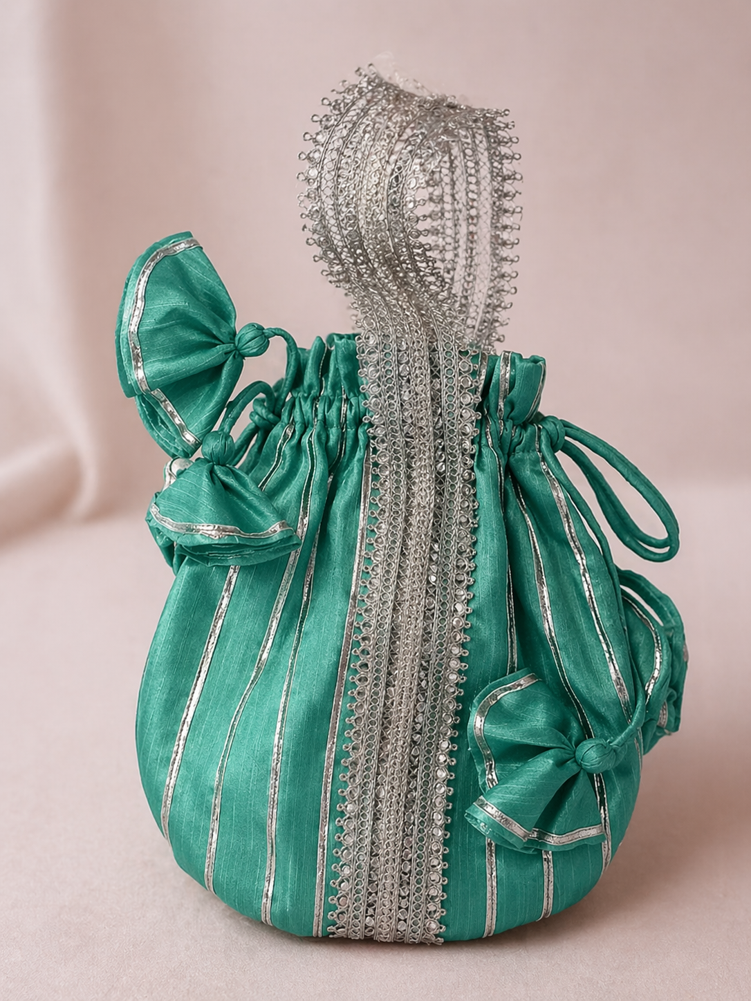 Sea Green Silk Potli Bag with Silver Embellished Panel & Drawstring Detailing for Festive Wear